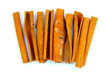 Dried cinnamon sticks arranged in a bundle.