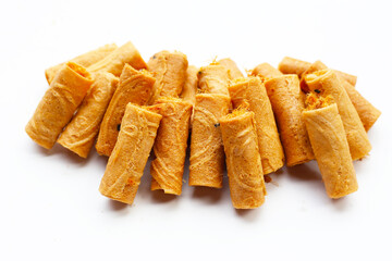 Rolled crispy wafers filled with shredded pork floss, Thai snack.