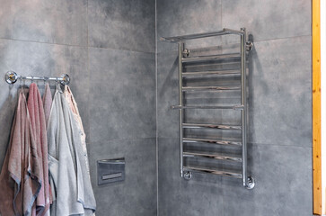 Newly installed towel rail and radiator powered by a new generation heat pump seen in a newly...