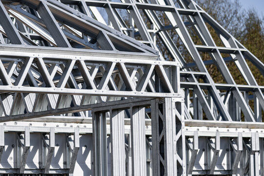 Light gauge steel framing system used for house construction. Wall to be clad with fibre cement board. Metal frame of a new modern house. Copy space