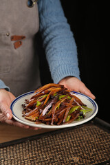 Pickled Vegetable Salad with Shredded Carrots and Peppers Served on White Plate