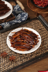 Asian Seaweed Salad with Traditional Table Setting on Rustic Wood Background
