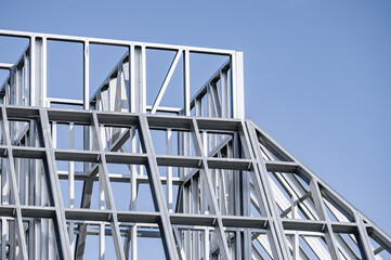 Light gauge steel framing system used for house construction. Wall to be clad with fibre cement board. Metal frame of a new modern house. Copy space