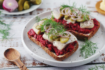 Scandinavian sandwiches with herring and beetroot	