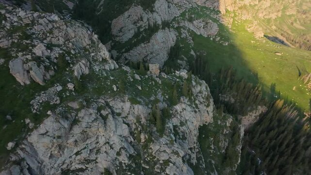 Majestic mountains, lush green valleys, and pristine rivers flowing through dense forests create a breathtaking panorama in ala archa national park, Kazakhstan