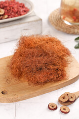 Dried Cornhusk Silk Threads for Herbal Tea Infusion on Wooden Board - Natural Health Ingredient