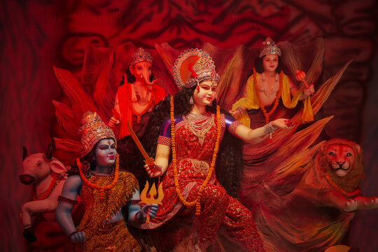 Durga family idol with Shiva Ganesha Kartikeya, Navratri Durga maa family statue, Hindu divine family sculpture, Durga puja decoration with full family stock photo.