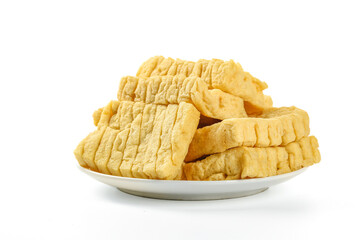 Dried Bean Curd Skin Rolls on White Plate - Traditional Asian Tofu Product Isolated on White Background