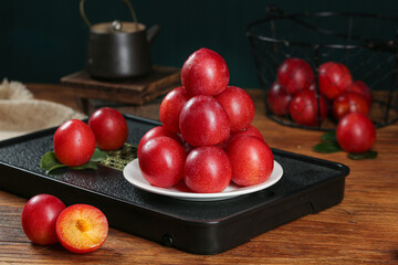 Fresh Red Plums on Kitchen Counter - Healthy Organic Stone Fruit Display