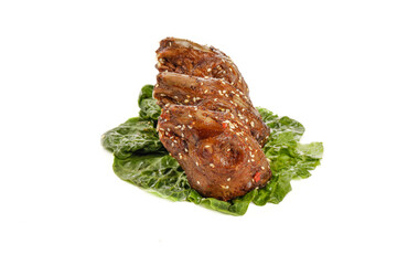 Spicy Chinese Rabbit Head Shuangliu Style Traditional Asian Cuisine Dish with Lettuce Garnish