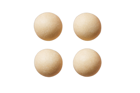 Four light beige, round pills/tablets arranged in a grid