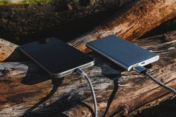 Smartphone Charging with Portable Power Bank Outdoors
