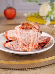 Dried Persimmon Cake with White Frost Powder Traditional Asian Sweet Confection on Plate