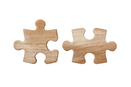 Two light brown wooden puzzle pieces