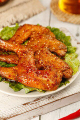 Spicy Szechuan Roasted Rabbit Legs Chinese Cuisine Dish with Chili Peppers