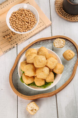 Golden Handfried Tofu Puffs with Soybeans - Traditional Asian Vegetarian Protein Food