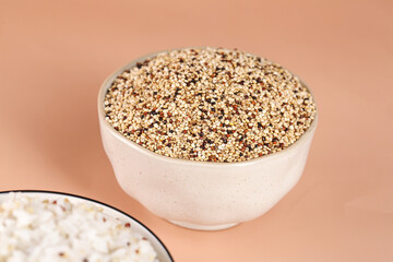 Mixed Tricolor Quinoa Grains in White Bowl - Healthy Superfood Cereals and Ancient Grains for Cooking