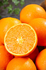 Fresh Sweet Gannan Navel Oranges Cut in Half Showing Juicy Citrus Segments