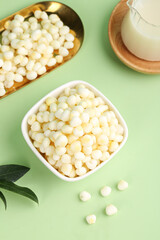 Fresh Corn Puffs Cereal Bowl with Milk Pitcher Healthy Breakfast Food Photography