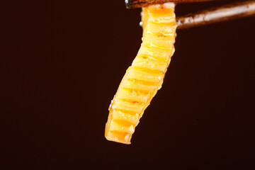Spicy Konjac Vegetable Strips with Chopsticks - Asian Food Ingredient Close-up