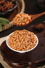Japanese Natto Fermented Soybeans in Bowl with Wooden Spoon Traditional Asian Food