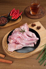 Raw Rabbit Meat Foreleg with Sichuan Spices and Red Chilies - Traditional Chinese Cooking Ingredients