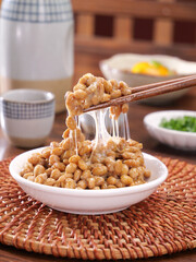 Japanese Natto Fermented Soybeans with Chopsticks Showing Sticky Strings Traditional Asian Food