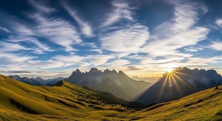 Breathtaking sunrise over an alpine valley with dramatic clouds and golden light.