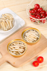 Canned White Asparagus Spears in Jars with Cherry Tomatoes on Wooden Board