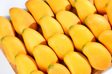 Fresh Hainan Mangoes in Wooden Basket - Tropical Fruit Display from China
