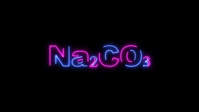 Neon chemical formula Na2 C O3 glowing in blue and pink on black Na2CO3 sodium carbonate