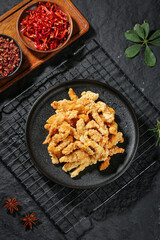 Crispy Fried Pork Rinds with Chili Spices - Asian Night Market Street Food Snacks