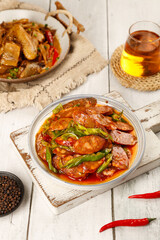 Handmade Smoked Sichuan Sausage Dishes with Peppers and Tea Traditional Chinese Cuisine