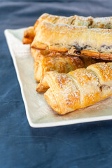 Puff pastry braid with jam filling. Baked goods. Desserts. Food concept.