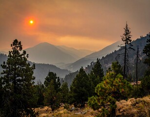 Smoky sunset over a mountain valley