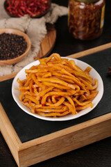 Shredded Papaya Salad Appetizer with Traditional Spices and Condiments on Rustic Wooden Serving Board