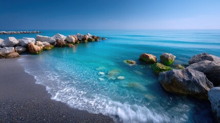 Dramatic Seascape with Turquoise Water and Rocky Coastline in Bright Sunlight HDR Image