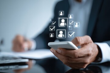 Close-up of a person using a smartphone, with digital user icons and checkmarks overlaid.  Businessperson reviewing applications or data on mobile