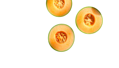 Three cantaloupe slices, halved, showcasing vibrant orange flesh and dark seeds against a stark black background, arranged asymmetrically