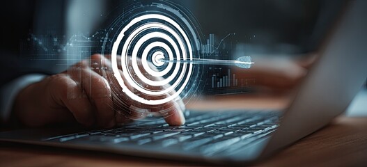 Businessperson using a laptop, targeting a goal with an overlay of a digital dartboard and data charts