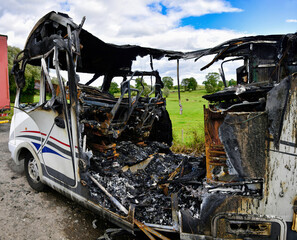 D859288 Burnt-out camper van