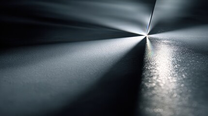 Dynamic Radiance: An abstract view of light cascading across a metallic surface, with striking contrasts and textures.