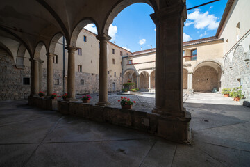 Cloister of Abbazia di San Salvatore, romanesque styled medieval church in Tuscany, Italy
