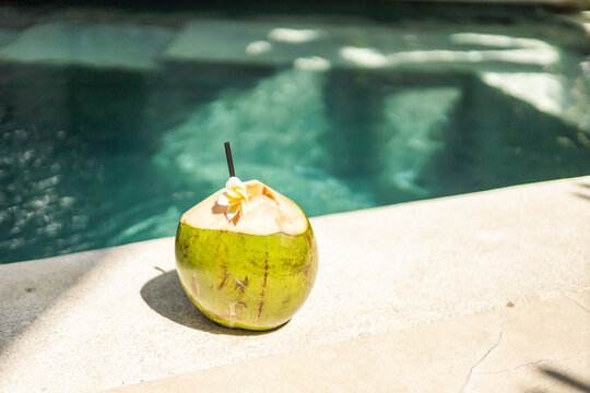 coconut drink next to the pool