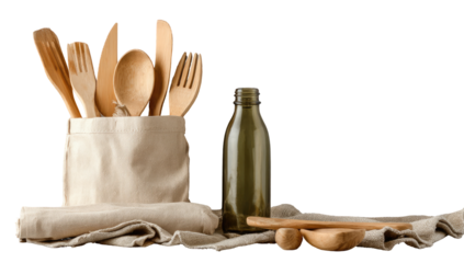 Beige canvas bag filled with wooden cutlery and a small olive-green bottle
