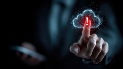 Business hand points to a cloud with a red exclamation mark