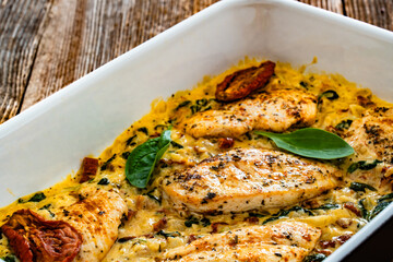 Creamy Tuscan chicken with parmesan cheese, spinach and sun dried tomatoes