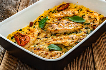 Creamy Tuscan chicken with parmesan cheese, spinach and sun dried tomatoes