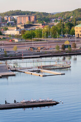 Naklejka premium Floating swimming pools with sauna at Allmanna harbour bath in Frihamnen, Gothenburg, Sweden, sunny day