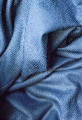 Fototapeta premium blue satin fabric as background, closeup of photo, texture